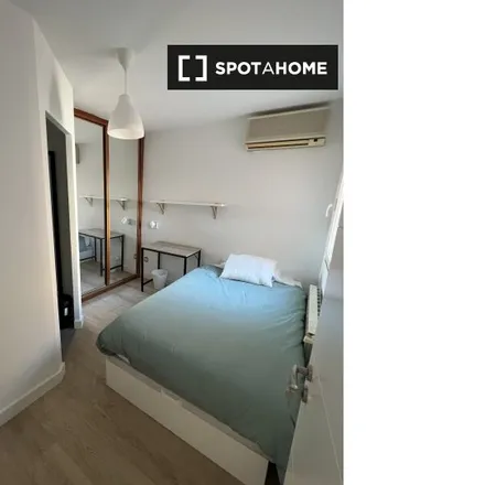 Rent this 4 bed room on Calle Geranio in 12, 28903 Getafe