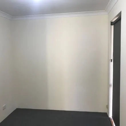 Rent this 4 bed townhouse on Manyarra Turn in Joondalup WA 6028, Australia