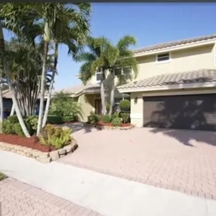 Rent this 5 bed house on 9649 Northwest 39th Street in Cooper City, FL 33024