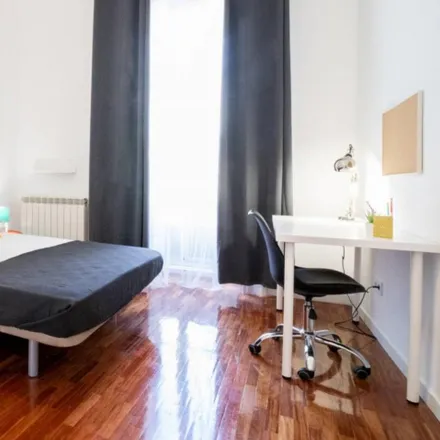 Rent this 11 bed room on Calle de Fuencarral in 36, 28004 Madrid