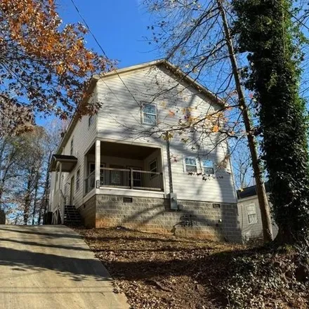 Buy this 6 bed house on 1967 East Avenue Northwest in Simsville, Atlanta