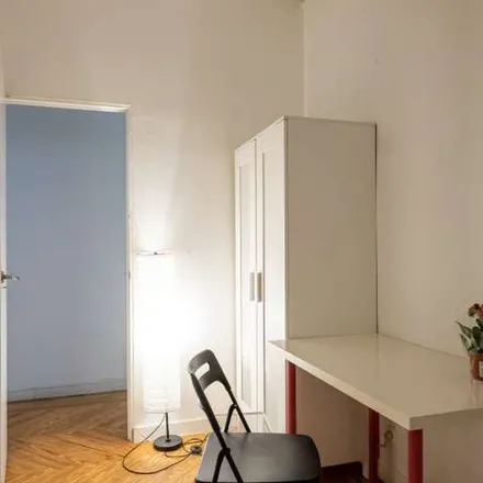 Rent this 9 bed apartment on Madrid in Librería Bárdon, Plaza de San Martín