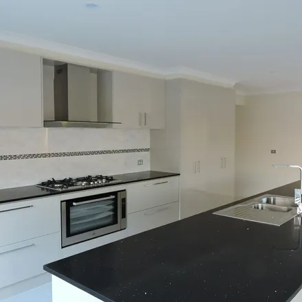 Rent this 5 bed apartment on Bindarri Grove in Botanic Ridge VIC 3977, Australia