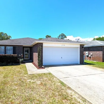 Rent this 3 bed house on 1967 Catline Circle in Navarre, FL 32566