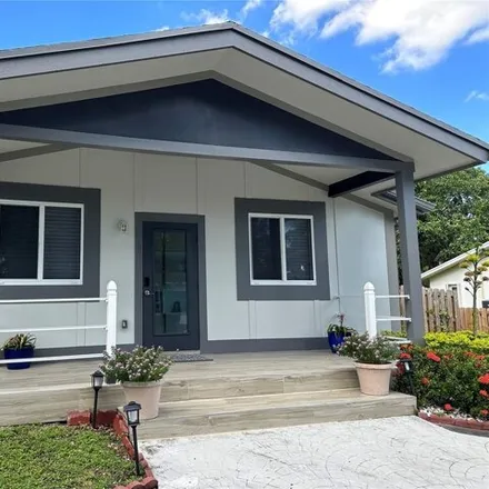 Rent this 3 bed house on 4537 Southwest 26th Terrace in Avon Park, Dania Beach