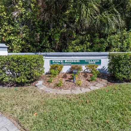 Buy this 2 bed condo on 1264 Pine Ridge Circle East in East Lake, FL 34688