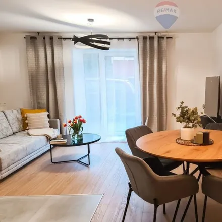 Rent this 3 bed apartment on Święty Marcin in 61-814 Poznań, Poland