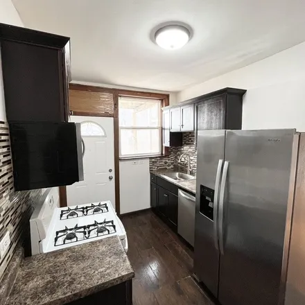 Rent this 2 bed apartment on 2150-2154 North Kildare Avenue in Chicago, IL 60641