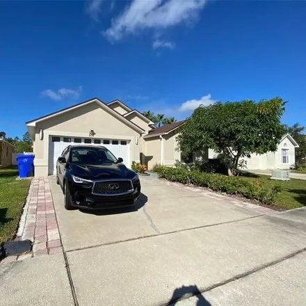 Rent this 4 bed house on 536 Eagle Pointe S in Kissimmee, Florida