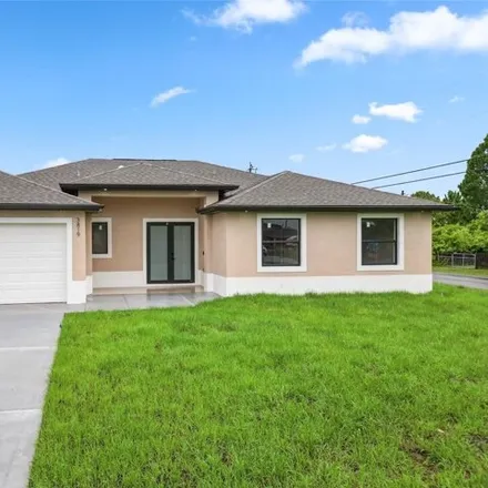 Buy this 4 bed house on 3819 19th St SW in Lehigh Acres, Florida