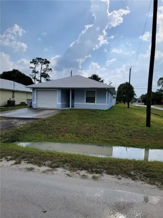 Rent this 3 bed house on 1522 12th Street Southwest in Florida Ridge, FL 32962