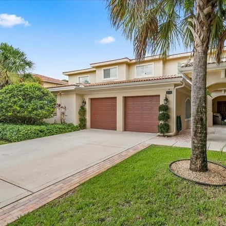 Rent this 4 bed townhouse on 129 White Wing Lane in Jupiter, FL 33458