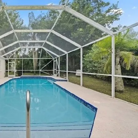 Rent this 4 bed house on 2098 Lake Breeze Court in Wellington, Palm Beach County