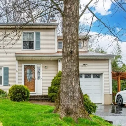 Rent this 4 bed house on 25 Gloucester Road in Parsippany-Troy Hills, NJ 07054