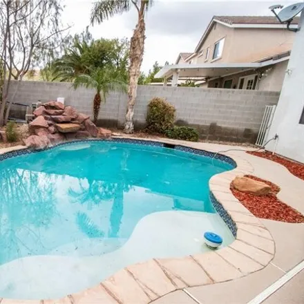 Rent this 4 bed house on 7842 Hidden Village Avenue in Las Vegas, NV 89131