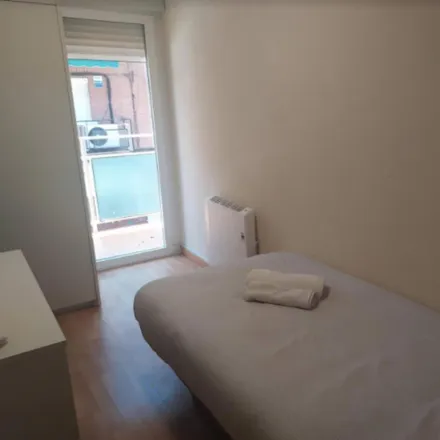 Rent this 12 bed room on Madrid in Farmacia - Calle San Basilio 24, Calle de San Basilio