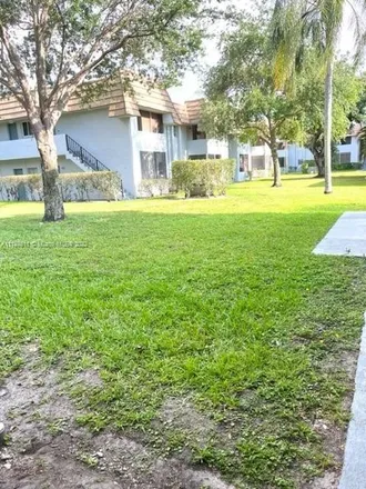 Buy this 2 bed condo on West Sample Road in Coral Springs, FL 33064