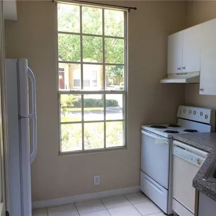 Image 6 - 1243 Aaron H. Dowd Court, MetroWest, Orlando, FL 32835, USA - Condo for sale