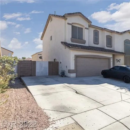 Buy this 4 bed house on 6091 Turtle River Avenue in Clark County, NV 89156