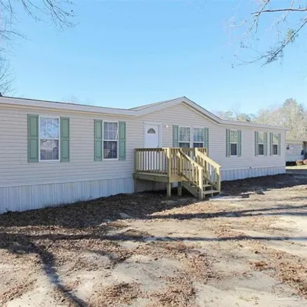 Buy this studio apartment on 963 Brookhills Drive in Escambia County, FL 32533