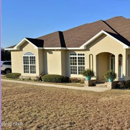 Buy this 4 bed house on 3311 Grey Oak Way in Marianna, FL 32446