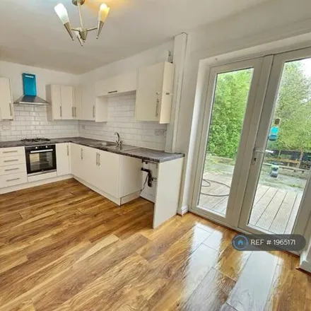 Rent this 3 bed townhouse on Kirkby Avenue in Manchester, M40 5HN