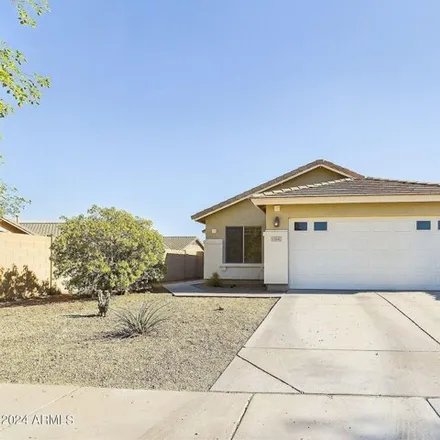 Buy this 4 bed house on 13941 West Banff Lane in Surprise, AZ 85379