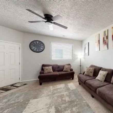 Buy this 4 bed apartment on 6820 Kayser Mill Road Northwest in Paradise Hills Civic, Albuquerque