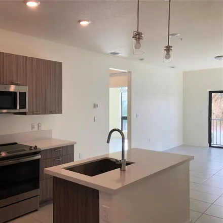 Rent this 3 bed condo on McDonald's in Northwest 41st Street, Doral