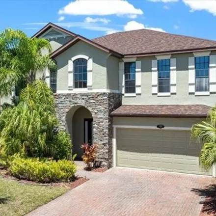 Buy this 5 bed house on 1384 Talon Way in Melbourne, FL 32934