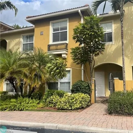 Rent this 4 bed townhouse on 5401 Northwest 28th Avenue in Tamarac, FL 33309