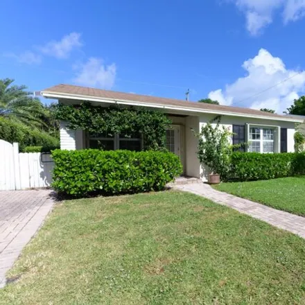 Buy this 3 bed house on 353 Puritan Road in West Palm Beach, FL 33405
