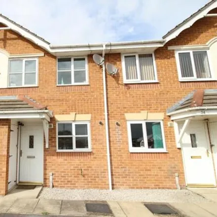 Rent this 2 bed townhouse on Pavilion Court in Dewsbury, WF12 8RZ