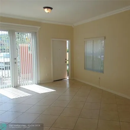 Rent this 3 bed townhouse on 2201 Mariner Court in Dania Beach, FL 33312