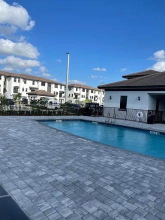Rent this 3 bed townhouse on 7-Eleven in 1 West Flagler Street, Miami