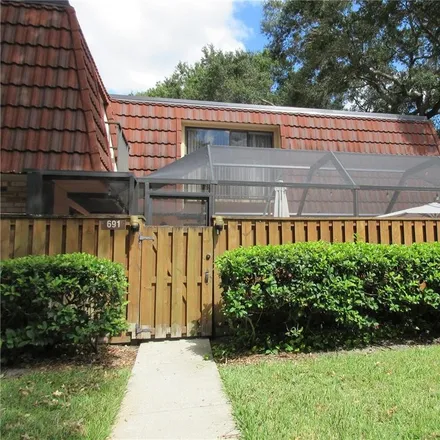 Buy this 3 bed townhouse on 691 1st Court in Saint George, Palm Harbor