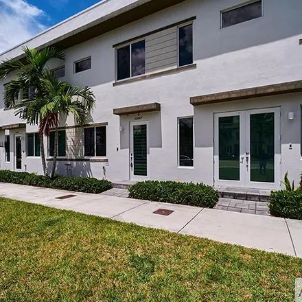 Rent this 3 bed townhouse on 10447 NW 66th St