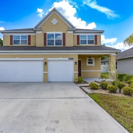 Buy this 4 bed house on 5299 Northwest Wisk Fern Circle in Port Saint Lucie, FL 34986