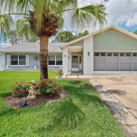 Buy this 3 bed house on 11 Bird of Paradise Drive in Palm Coast, FL 32137