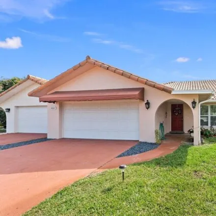 Buy this 3 bed house on 4002 SE Fairway W in Stuart, Florida