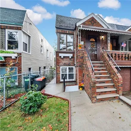 Buy this 5 bed townhouse on 3812 Quentin Road in New York, NY 11234