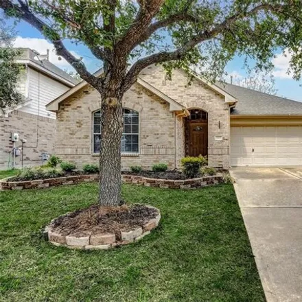 Rent this 3 bed house on 3299 Raintree Village Drive in Harris County, TX 77449