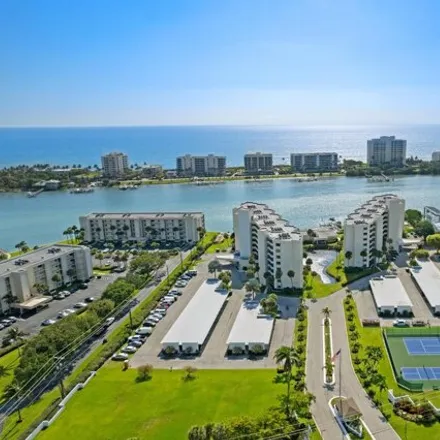 Rent this 2 bed condo on Sandpointe Bay Drive South in Palm Beach County, FL 33469
