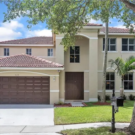 Rent this 4 bed house on 4059 Pinewood Lane in Weston, FL 33331