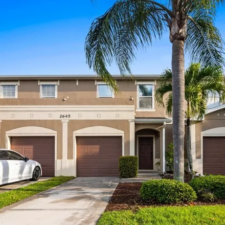 Buy this 3 bed townhouse on 2638 Revolution Street in Melbourne, FL 32935
