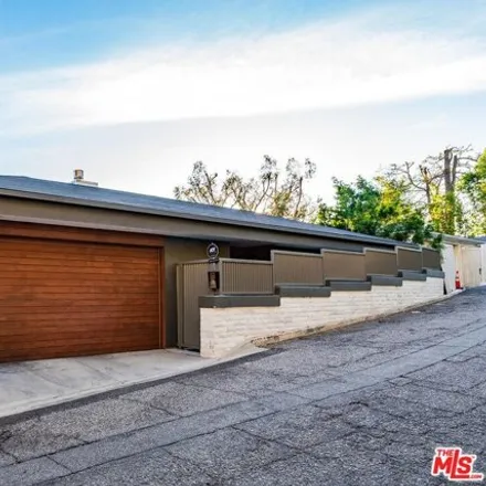 Rent this 4 bed house on 8838 Hollywood Boulevard in Los Angeles, CA 90069