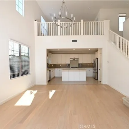 Rent this 4 bed condo on 105 Holly Springs in Irvine, CA 92618