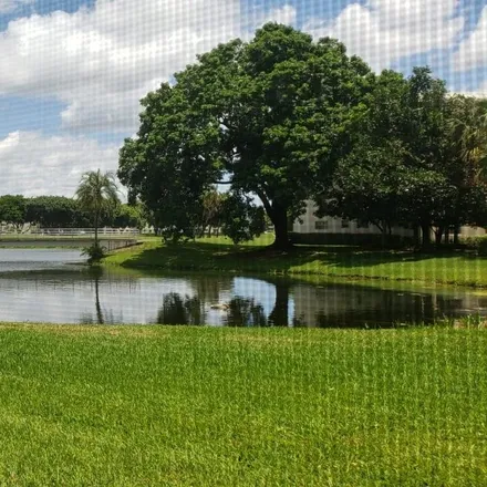 Rent this 3 bed apartment on Wynmoor Golf Course in Northwest 44th Avenue, Coconut Creek Park