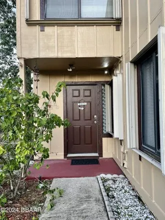 Rent this 2 bed townhouse on 112 Oakwood Village Circle in Daytona Beach, FL 32119