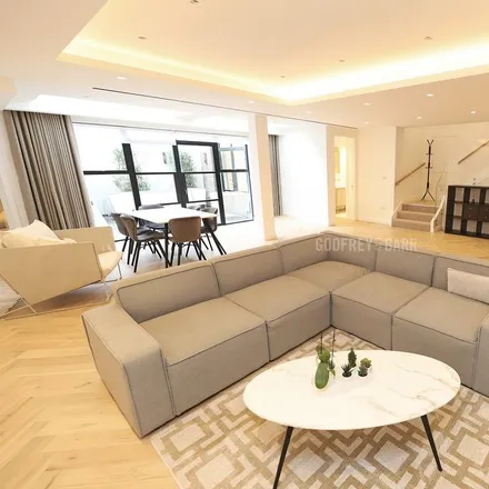 Rent this 4 bed apartment on Finchley Offlicence in Spencer Courtyard, London